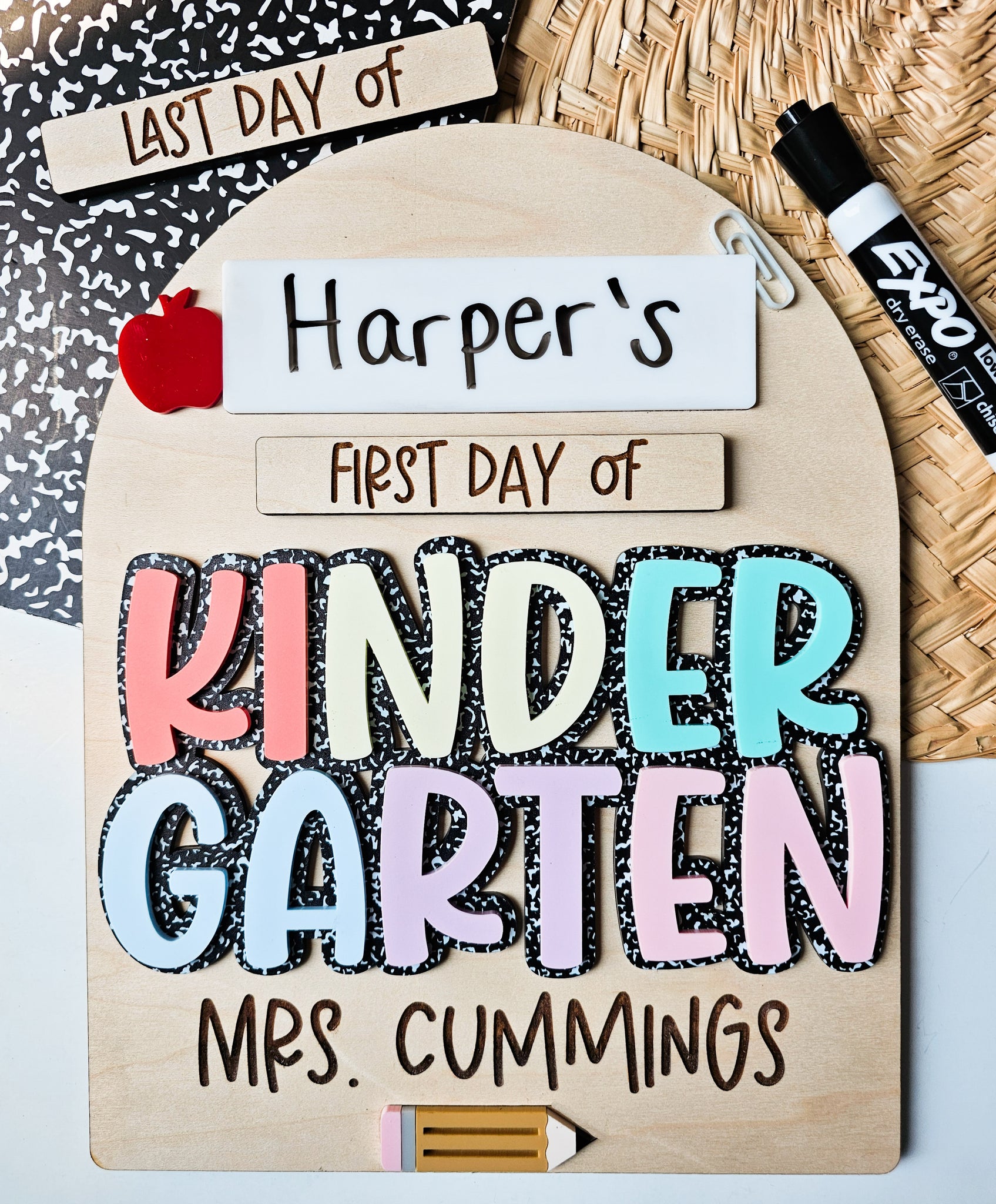 Student and Grade Teacher Sign