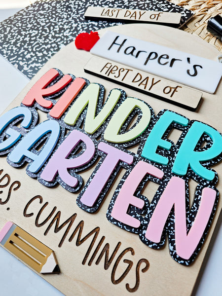 Student and Grade Teacher Sign